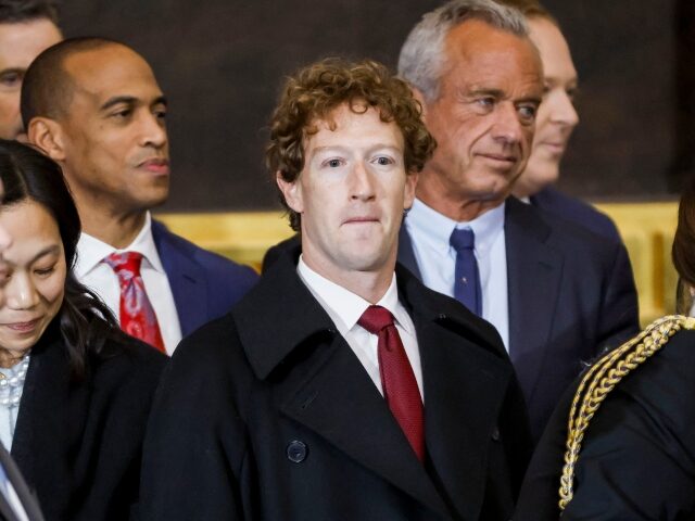 Mark Zuckerberg stifles a grin