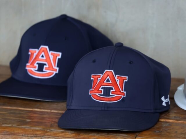 Michael Wade_Icon Sportswire via Getty Images (2) BIRMINGHAM, AL - APRIL 04: A general view of Auburn baseball caps during the game between