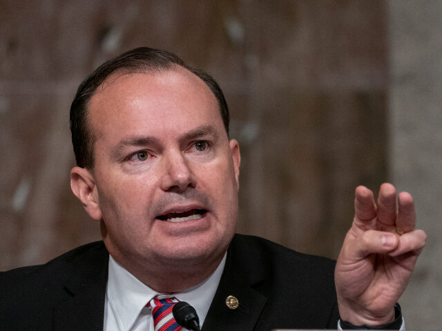 U.S. Sen. Mike Lee (R-UT) asks a question of former FBI Director James Comey at a hearing