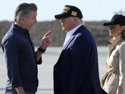 FILE - President Donald Trump and first lady Melania Trump listen to California Gov. Gavin