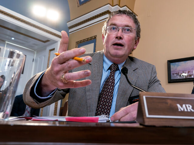 Thomas Massie Rep. Thomas Massie, R-Ky., joined at right by Rep. Ralph Norman, R-S.C., both members of t