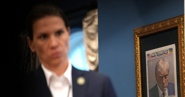 White House Hangs Iconic Trump Mug Shot in Entryway to Oval Office