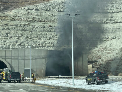 This photo provided by the Wyoming Highway Patrol shows smoke from a multiple-vehicle cras