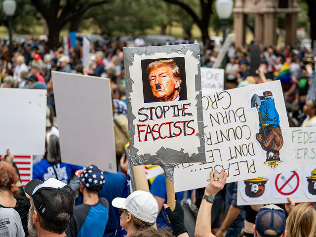 AUSTIN, TEXAS - FEBRUARY 05: People gather in protest against U.S. President Donald Trump