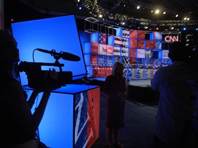 CHARLESTON, SC - JULY 23: A journalist tapes the YouTube-CNN Presidential Debate stage on