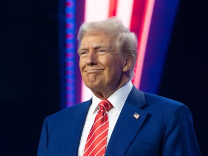 PHOENIX, ARIZONA - DECEMBER 22: U.S. President-elect Donald Trump smiles during Turning Po