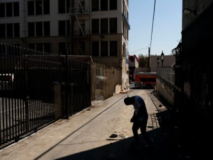 Anthony Delio, 36, falls asleep standing up in an alley after smoking fentanyl in Los Ange