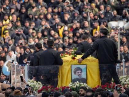 A trailer carrying the coffins containing the bodies of Hezbollah's former leader Has