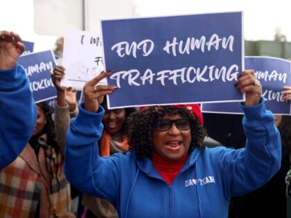 OAKLAND, CALIFORNIA - JANUARY 24: Alameda County District Attorney Pamela Price, with memb