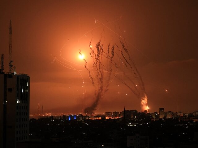 TOPSHOT - A salvo of rockets is fired by Palestinian militants from Gaza as an Israeli mis