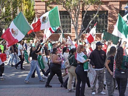 SAN DIEGO, UNITED STATES - FEBRUARY 02: Thousands of people march on the streets with plac