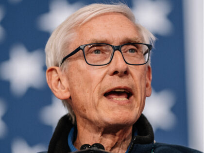 GREEN BAY, WISCONSIN - OCTOBER 14: Wisconsin Governor Tony Evers speaks at a rally in supp