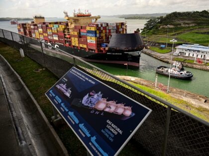 Liberian flagged MSC Gabon cargo ship is towed at the Panama Canal's Agua Clara locks