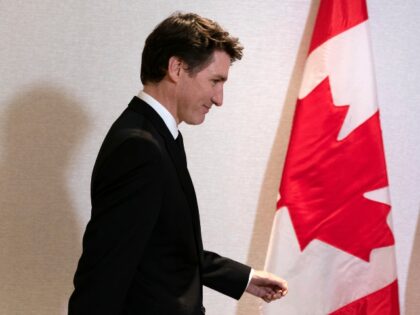 Canada's Prime Minister Justin Trudeau arrives to speak to the media after a meeting