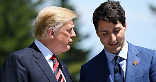 NextImg:Justin Trudeau Nudges Donald Trump as Canada Beats USA in 4 Nations Face-Off Final