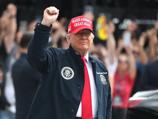 DAYTONA BEACH, FL - FEBRUARY 16: President of the United States Donald J. Trump waves to t