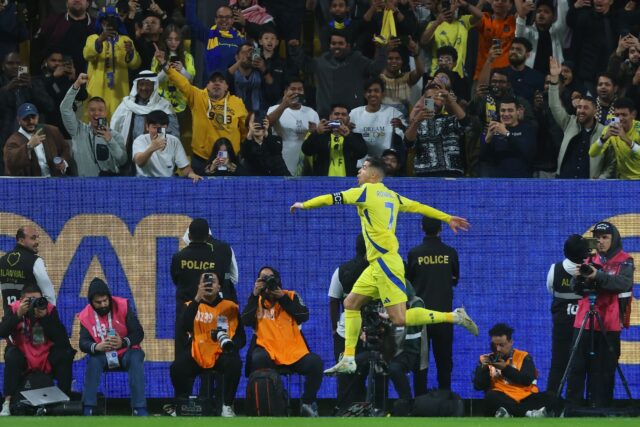 Al Nassr's Portuguese forward Cristiano Ronaldo celebrates scoring in the Saudi Pro League