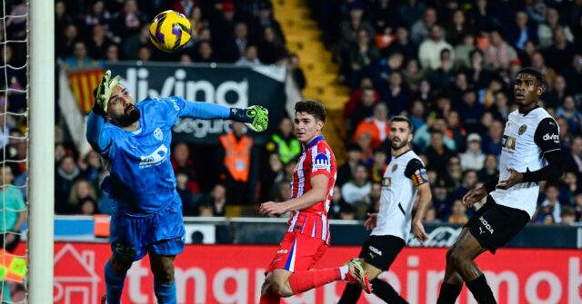 Atletico Madrid tops La Liga after 3-0 Valencia win