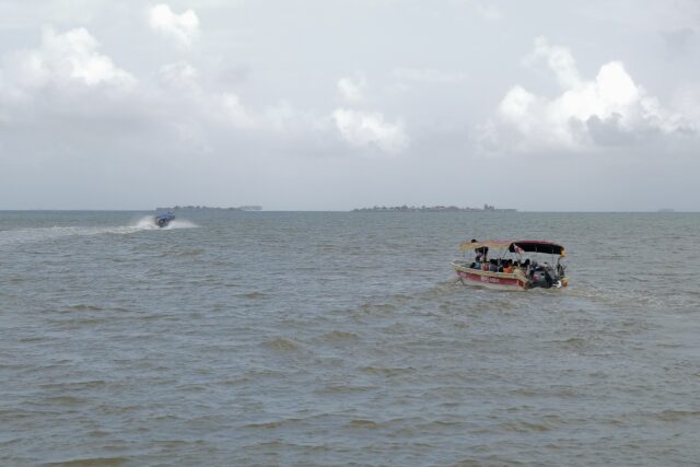 Several boats with dozens of migrants set off from a Panama port, headed for Colombia