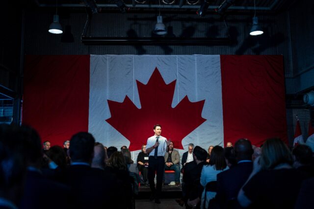 Canadian Prime Minister Justin Trudeau gives opening remarks at an economic summit on Febr