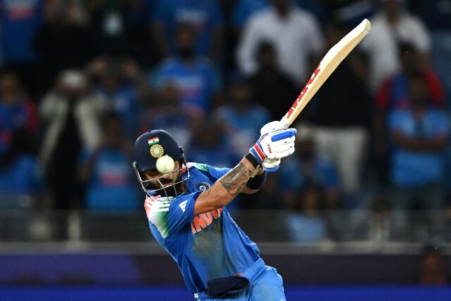 India's Virat Kohli hits the winning boundary against Pakistan in Dubai