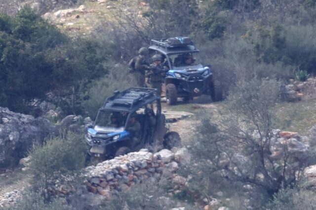 Israeli army forces patrol in the village of Kfarshuba, southern Lebanon, the day before a
