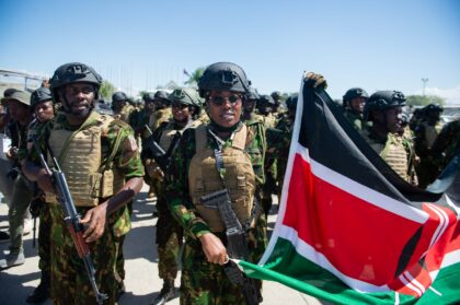 Kenyan police officers arrive at Toussaint Louverture International Airport in Port-au-Pri