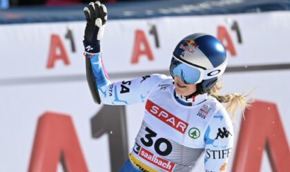 Lindsey Vonn salutes the crowd in the finish area after failing to finish the super-G