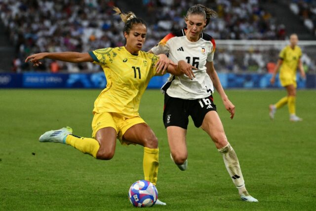 Mary Fowler (L) in action at the Olympics