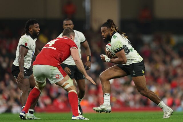 Running back: Fiji centre Waisea Nayacalevu (R), pictured in action against Wales in Novem