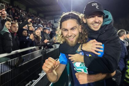 Shock victory: Stade Briochin's Leo Yobe celebrates with a fan