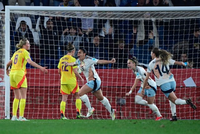 Spain's Cristina Martin-Prieto (C) celebrates scoring her team's third goal late on agains