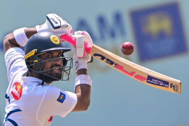 Sri Lanka's Dinesh Chandimal watches the ball after playing a shot against Australia