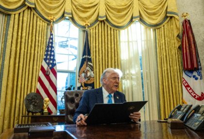 US President Donald Trump speaks to the press as he signs executive orders in the Oval Off