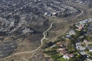 Officials declare California wildfires contained as they begin the long task of recovery