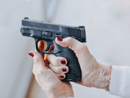 woman with a gun