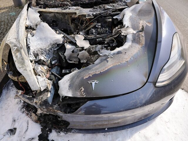 A burned out Tesla torched by Terrorists