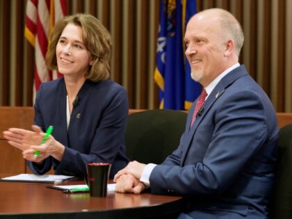 Wisconsin Supreme Court candidates Brad Schimel and Susan Crawford are seen before a debat