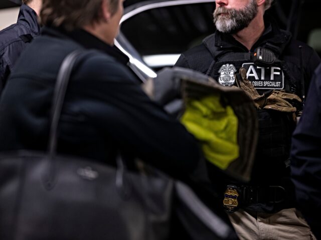 Bureau of Alcohol, Tobacco, Firearms and Explosives (ATF) agents, along with other federal