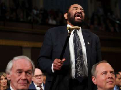 Representative Al Green, a Democrat from Texas, shouts during a joint session of Congress