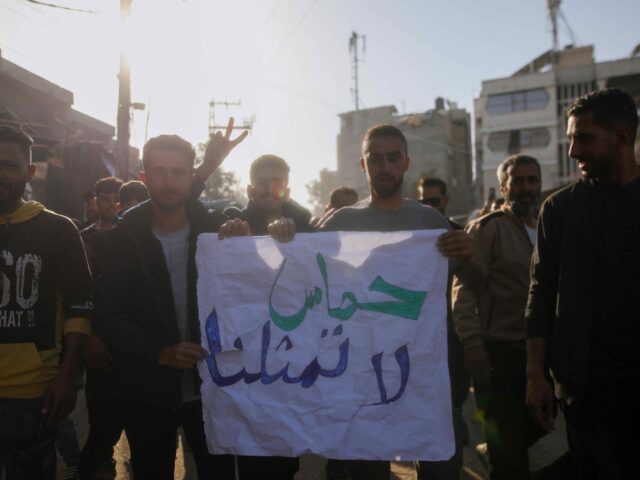 Palestinians chant slogans during an anti-Hamas protest, calling for an end to the war wit