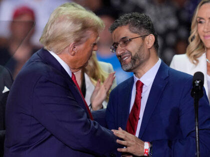 Hamtramck, Mich., Mayor Amer Ghalib, right, and Republican presidential nominee former Pre