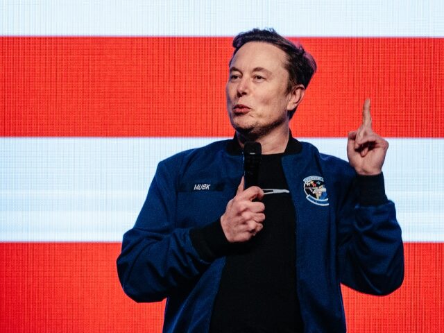 Elon Musk in front of a giant American flag