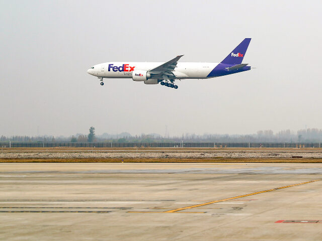 FedEx plane Flight FX5286 operated by FedEx lands at Qingdao Jiaodong International Airport in Qingdao