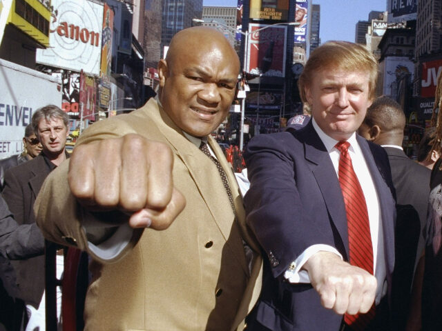 Boxer George Foreman (left) and Shannon Briggs (not pictured) with Donald Trump at the Off