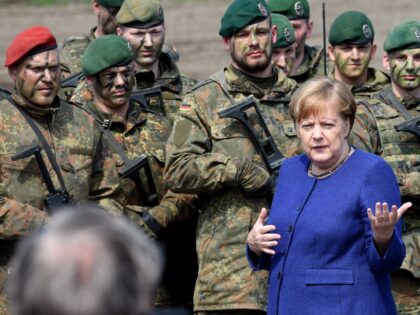 German Chancellor Angela Merkel talks to soldiers of the German armed forces Bundeswehr du