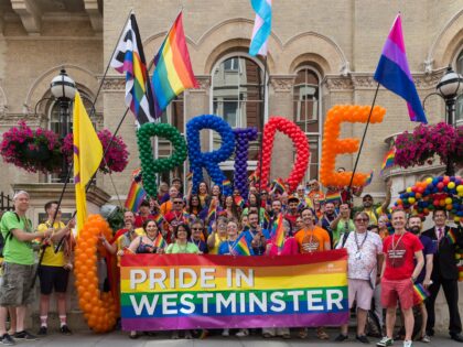 Participants gather for the Pride in London parade on 06 July, 2019 in London, England. Th