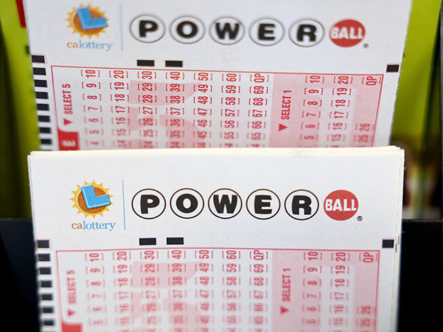 Powerball play slips are displayed in a convenience store on July 18, 2023 in Los Angeles,