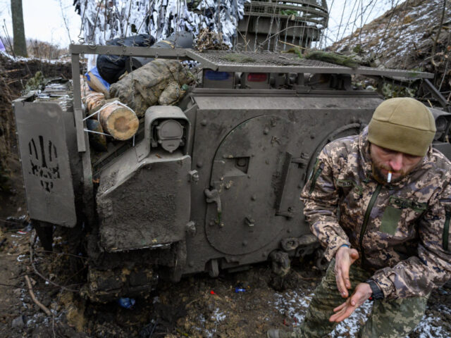 SUMY, UKRAINE - JANUARY 15: Vehicle commander Mikhailo, call sign Volia, stands beside his