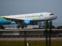 A Global X Airlines plane carrying Brazilians deported from the United States arrives at a